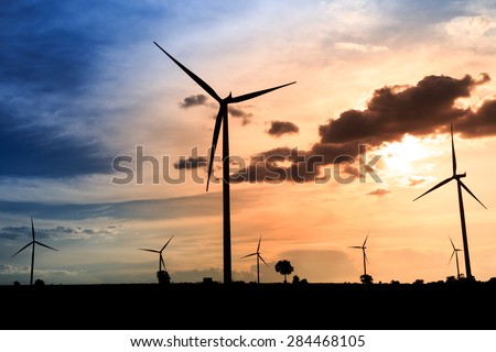 Wind turbines silhouette at sunset in Thailand