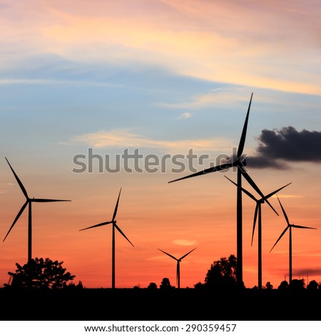 Wind turbines, wind Farms silhouette at sunset in Thailand