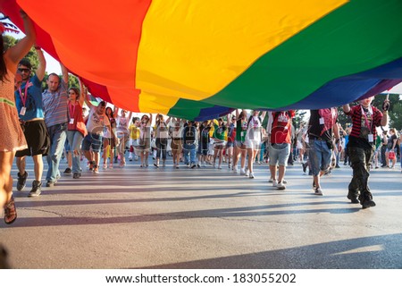 THESSALONIKI GREECE JUNE 15 Unidentified participants taking part to the second gay pride parade through the city on June 15 2013 in Thessaloniki Greece THESSALONIKI GREECE JUNE 15 Unidentified participants taking part to the second gay pride parade through the city on June 15 2013 in Thessaloniki Greece