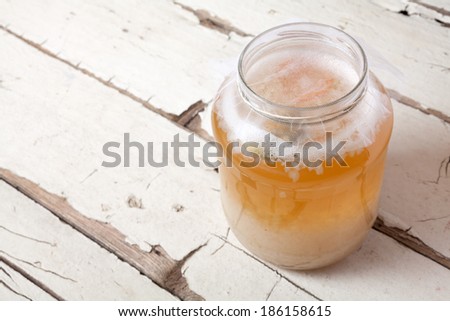 Water kefir grains on the bottom of jar