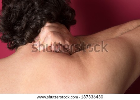 Man suffering from back neck ache, muscle pain