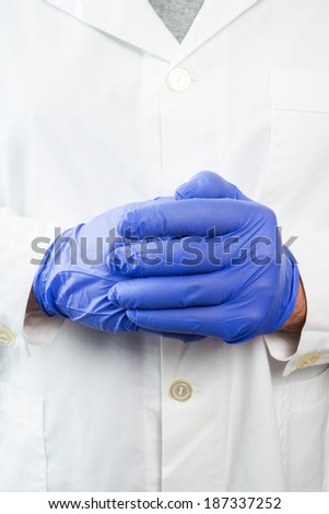 Doctor hands with blue gloves ready for examination