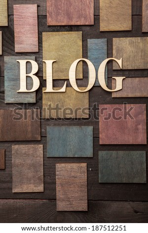 Wooden letters forming word BLOG written on wooden background
