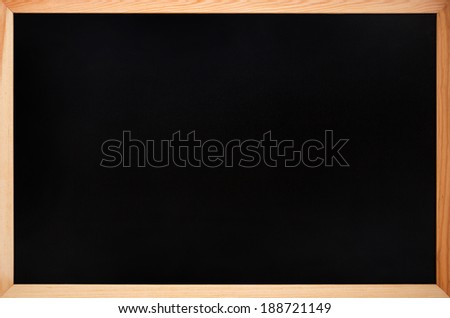 Blank chalkboard in wooden frame. School blackboard