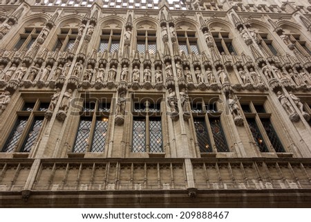 BRUSSELS, BELGIUM - JULY 23: Houses of the famous Grand Place on July 23, 2014, Brussels, Belgium. Grand Place was named by UNESCO as a World Heritage Site in 1998.