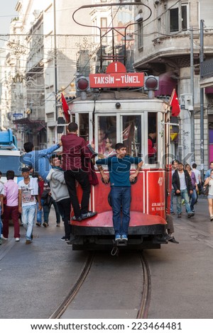 ISTANBUL, TURKEY - OCT 7: Vintage tram on the Taksim Street on October 7, 2014 in Istanbul, Turkey. Nostalgic tram of Istanbul is the heritage tramway system. It was re-established in 1990.