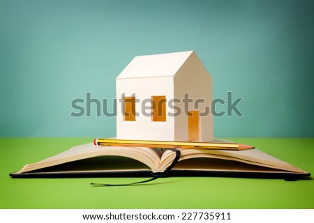 Requirements of the house. Paper house on memorandum block