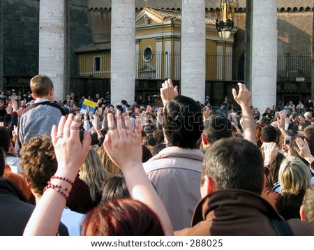 Praying  for the health of the pope at piazza san pietro in Rome.