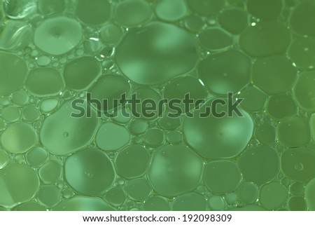 Macro shot of Olive oil mixed in water abstract and for background