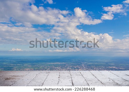 Blue sky land and white cloud background