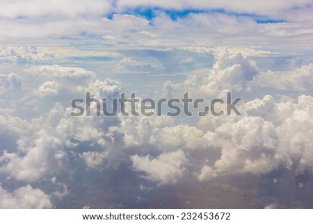 Cloudscape blue sky and white cloud with land on the airplan
