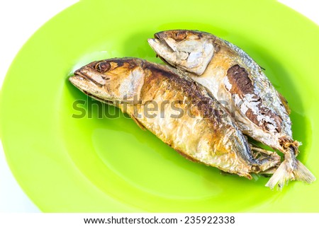 Fish fry side view/mackerel fry on green disk