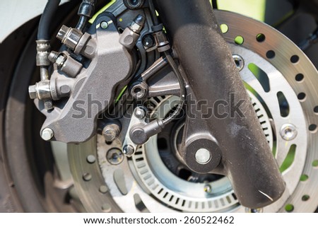 Disc brake of eco motorcycle, , scooter motorcycle background
