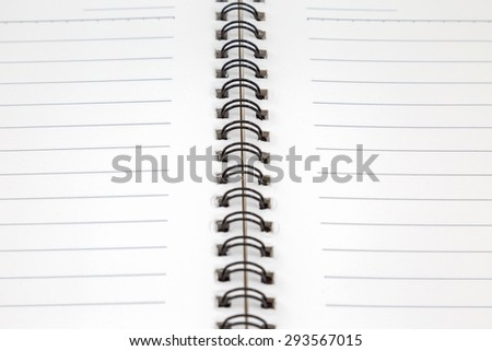 close up of blank white book on white background