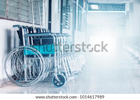 Row Wheelchairs in the hospital ,Wheelchairs waiting for patient services.