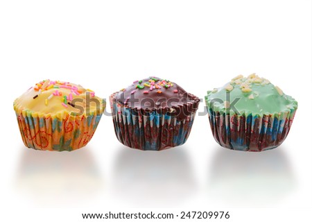 collection of cupcakes , isolated on white