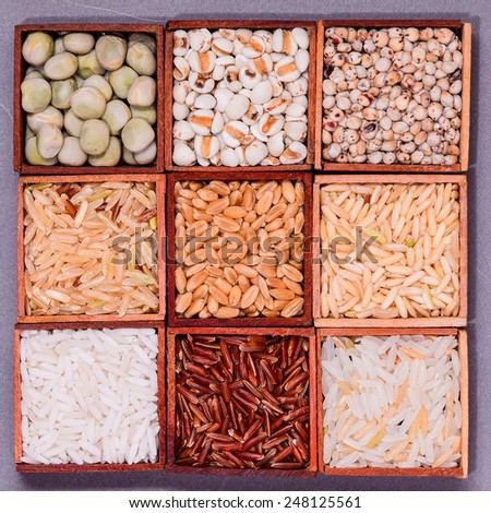 Collection of Rice, in a wooden box.