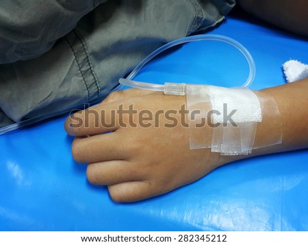 intravenous drip in arm children patient