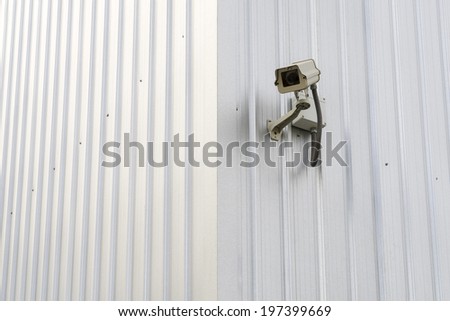 CCTV Camera on a corner metal sheet wall