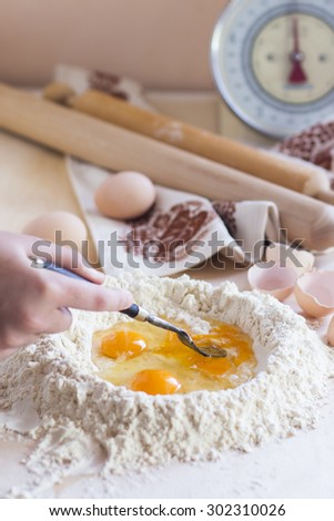 Making dough for fresh egg pasta. Kneading dough. See series