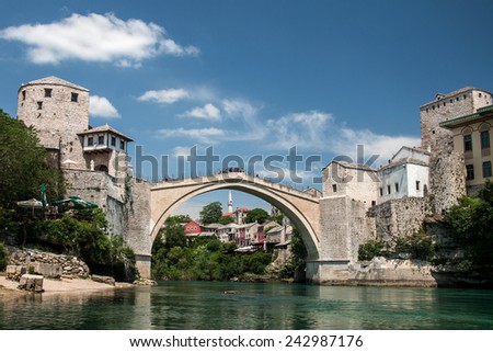 MOSTAR, BOSNIA AND HERZEGOVINA, MAY 12, 2010 - The famous bridge in Mostar, destroyed by war in 1993 and restored again and opened in 2004