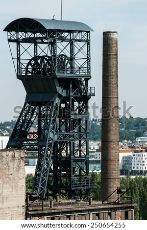 OSTRAVA, CZECH REPUBLIC, JULY 31, 2012 - Old coal mine shaft with mining tower and chimney