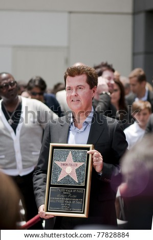 LOS ANGELES - MAY 23: American Idol creator Simon Fuller receiving the 2,441st Star Hollywood Walk of Fame Star for Television at Hollywood Blvd on May 23, 2011 in Los Angeles, CA.