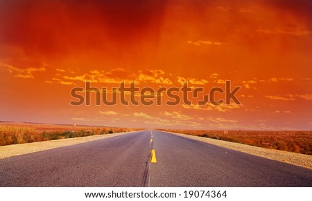 Desert Highway:Road travelling through a desert Field at Sunset(3)