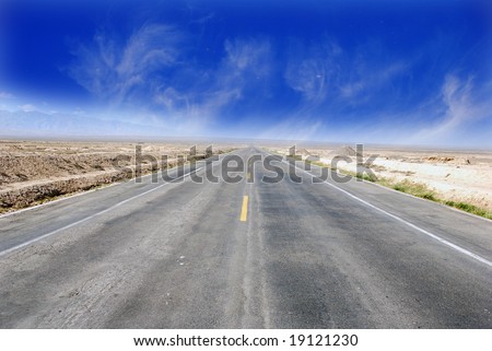 Desert Highway:Road travelling through a desert Field(3)