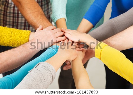 Closeup of human hands showing unity