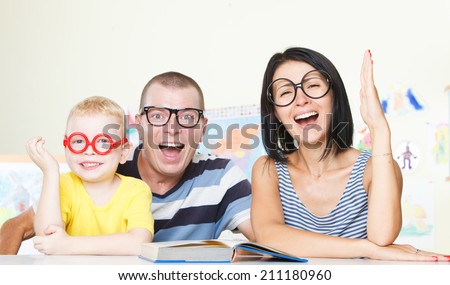 Family with glasses and Hands Up