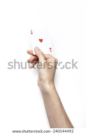 A female(woman) hand hold trump card(heart A) isolated white background at the studio.