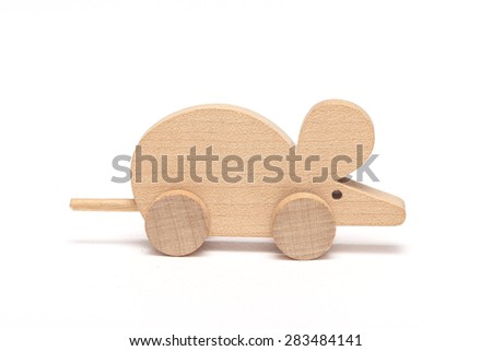 The wooden toy of mouse with wheel for kids front view isolated white background at the studio.