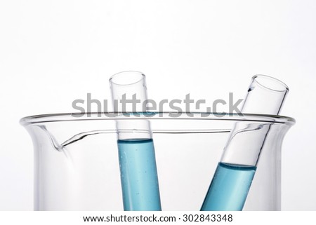 Test tube with blue(cyan) liquid(fluid, water) in the beaker for chemical, health at the laboratory and white background.