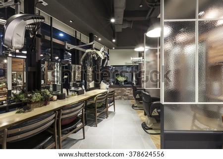 The Interior of modern(organic, vintage, natural) hair salon(beauty parlor, hairdresser\'s) with chair, red brick, marble bottom