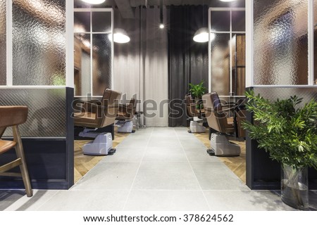 The Interior of modern(organic, vintage, natural) hair salon(beauty parlor, hairdresser's) with chair, red brick, marble bottom