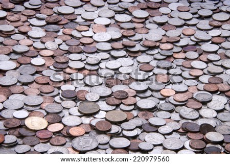 many American coins, quarters, nickels, dimes, pennies, fifty cent piece, dollar coins