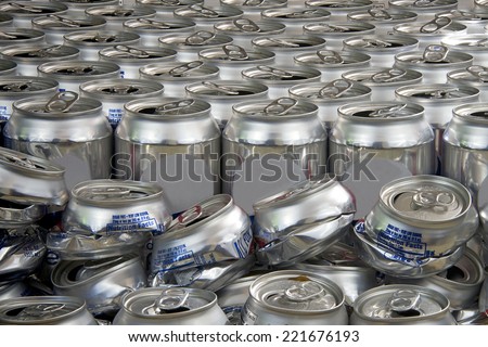 aluminum can recycling landscape close view crushed and uncrushed cans
