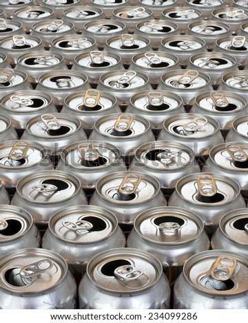 aluminum can recycling close up view tops of empty cans vertical view