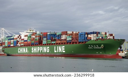 OAKLAND, CA - DECEMBER 08, 2014: China Shipping Lines (CSCL) Cargo Ship SUMMER docked at the Port of Oakland. CSCL, based in Shanghai, China, it is now the eighth largest container shipping company.