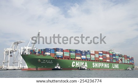 OAKLAND, CA - FEBRUARY 19, 2015: China Shipping Container Line Cargo Ship SPRING entering the Port of Oakland. CSCL is the seventh largest global container shipping liner by capacity.