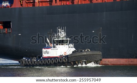 OAKLAND, CA - FEBRUARY 24, 2015: AmNav Tugboat REVOLUTION at the Port of Oakland. American Navigation was a pioneer in developing tugboats with high horsepower engines in relatively small hulls.