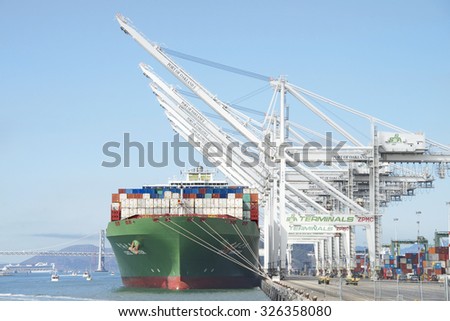 OAKLAND, CA - OCTOBER 10, 2015: China Shipping Lines Cargo Ship CSCL WINTER docked at the Port of Oakland. The Port of Oakland is the fifth busiest container port in the United States.