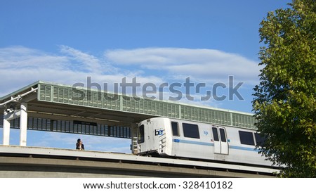 SAN LEANDRO, CA - OCTOBER 16, 2015: Bay Fair BART Station. The San Francisco Bay Area Rapid Transit train, carries commuters to their destinations in San Francisco, the East Bay and San Mateo County.