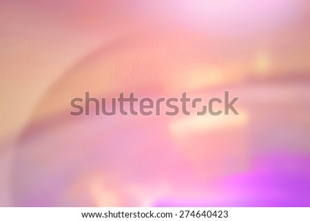 Blurred pink and purple electric fan background scene.