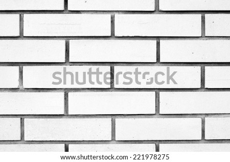 White wall of bricks gray scale