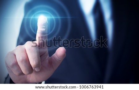 Businessman touching screen scan fingerprint biometrics identity to confirm, Protection security data concept