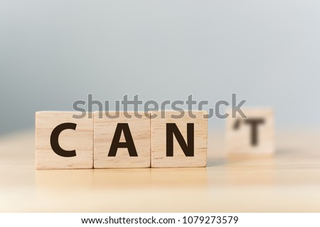 Personal development and career growth or change attitude yourself concept. Wood block cube with word CAN