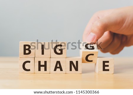 Hand flip wooden cube with word change to chance, Personal development and career growth or change yourself concept