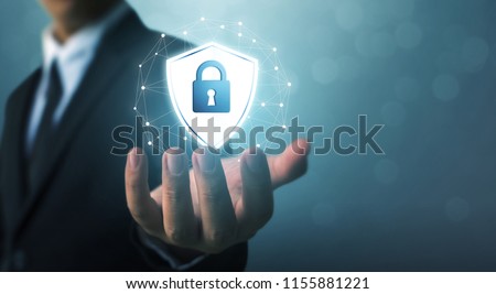 Protection network security computer and safe your data concept, Businessman holding shield protect icon